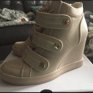 Brand new Aldo wedge sneakers..size 6.5